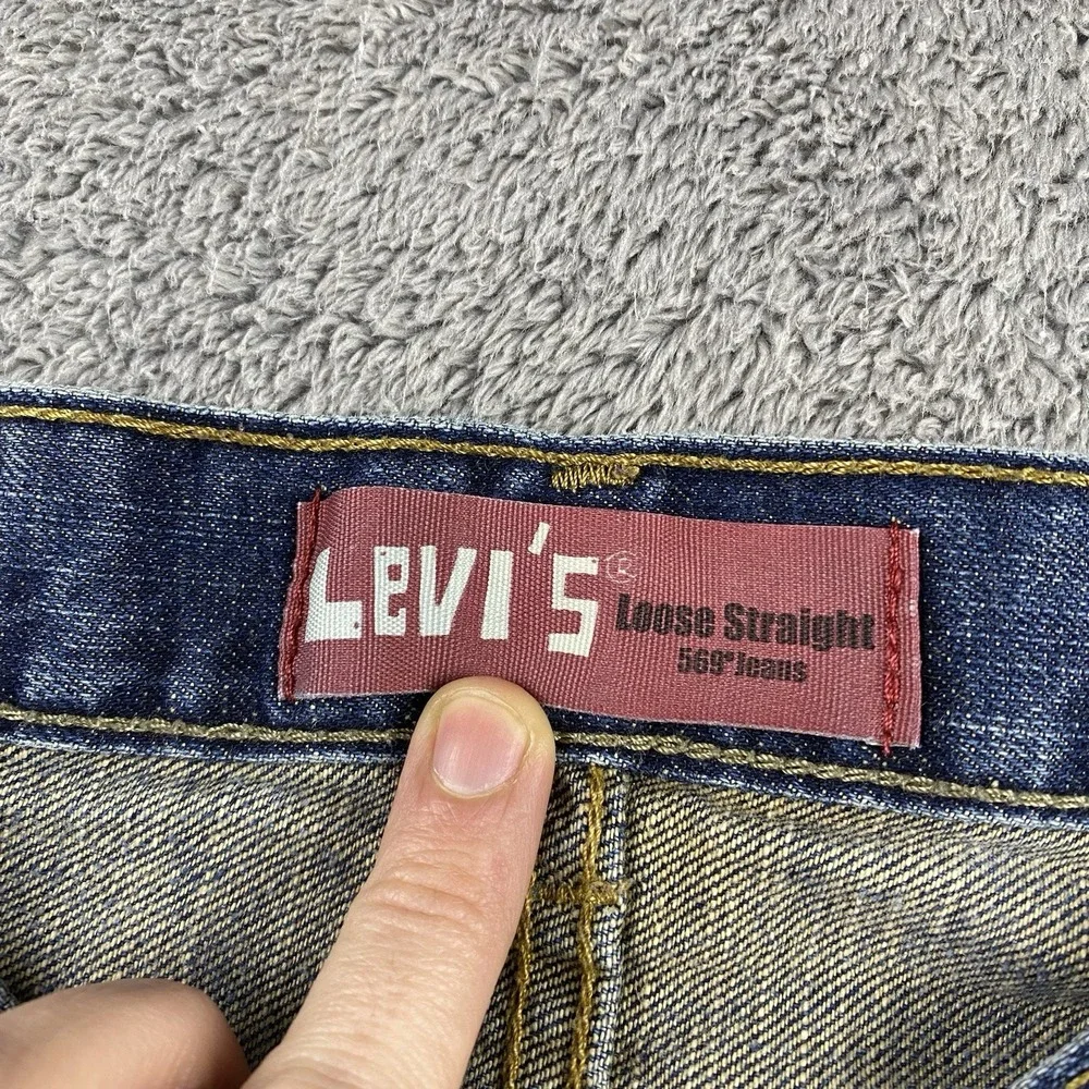 Levis 569 Loose Straight Jeans Youth 10 Slim 23x25 Blue Mid Rise Medium Wash VTG